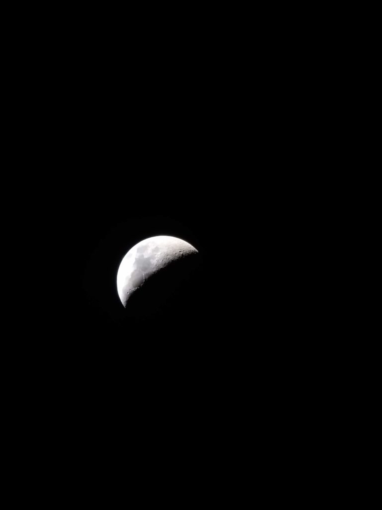 Quarter moon picture taken through a telescope